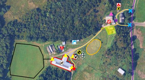 An overhead view of a goat and chicken farm marked with biosecurity and safety features using SAFE MApp.